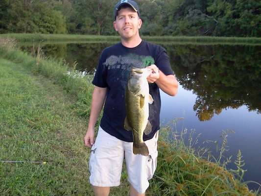 Brian Kondracki caught his best using a top water buzz bait from a private pond in Middleburg, Ohio, on July 21, 2013. 