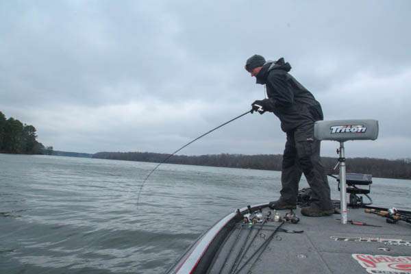 12:32 p.m. VanDam battles a big bass that hit his jig off a main-lake point.