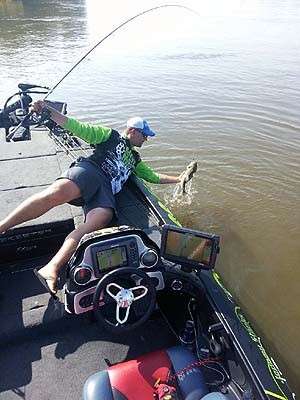 <p>Jeremy Starks hand landed a nice Alabama River bass. Photo by Bassmaster Marshal Wesley Seal. </p>
