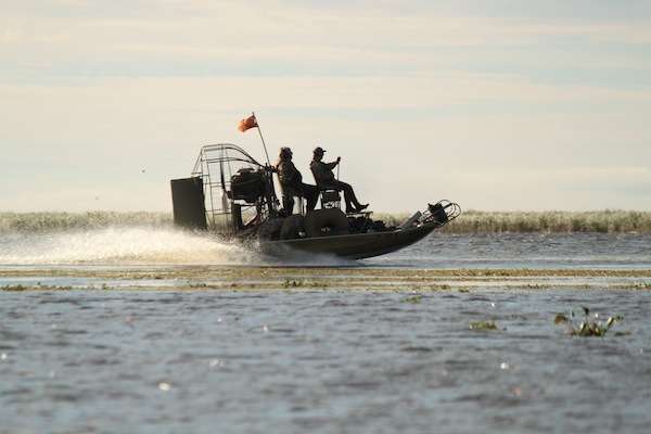 One of the braver airboats passes by wrangling the rough water.
