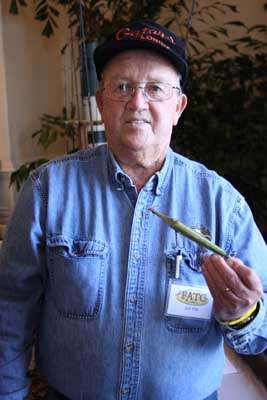 <p>Jim Pitt of Mineola, Fla., holds a Creek Chub Bait Company Gar Lure that's valued at better than $1,000 if new in the box (NIB). Creek Chub made the bait that caught George Perry's world record largemouth in 1932 (the Fintail Shiner) and the bait that would have held the record before that (Fritz Friebel's 20-15 came on a Pikie Minnow), had records been kept then.</p>
