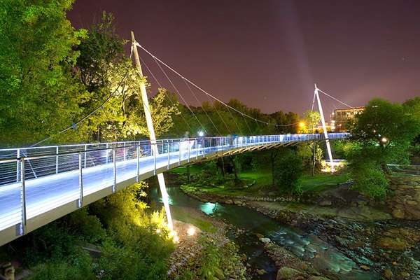 The Liberty Bridge is a pedestrian walkway that travels over the Reedy River in downtown Greenville. 