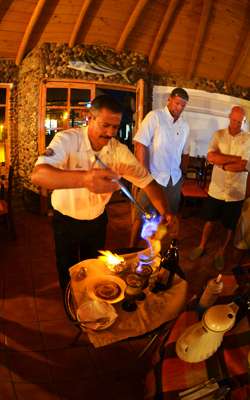 <p>
	When was the last time you had a bartender drip flames into your cocktail from an orange peel? Oh, probably never. This concoction takes 10 minutes to make, 9 1/2 of them are the nifty fire show.</p>
