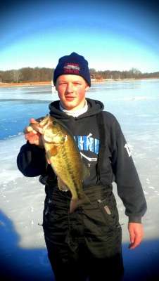 <p>One of the benefits of being able to tolerate the Minnesota cold weather is the ability to pull bass like this out from underneath the ice. Check out Mitch Swanny's catch!</p>
