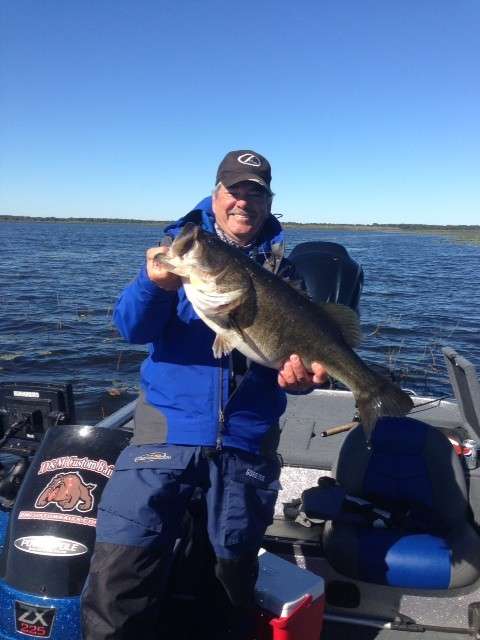 Jim Garrett of Tyrone, Ga., shows off a 9-13 fish caught in practice.