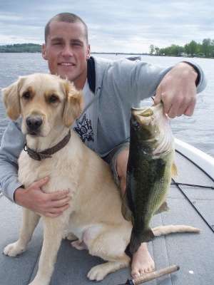 <p>Ryan Lindsay shows off his two great catches â a nice-size bass and a great dog.</p>
