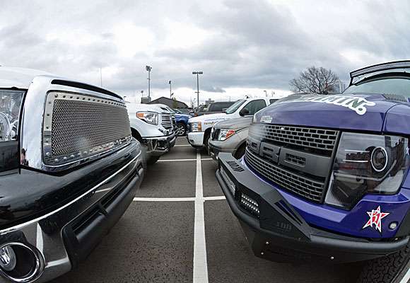 The parking lot at Bassmaster Classic Media Day was slap full of customized trucks and boats.