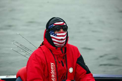 This unidentified co-angler is already showing the American spirit for the upcoming Olympic Games. 