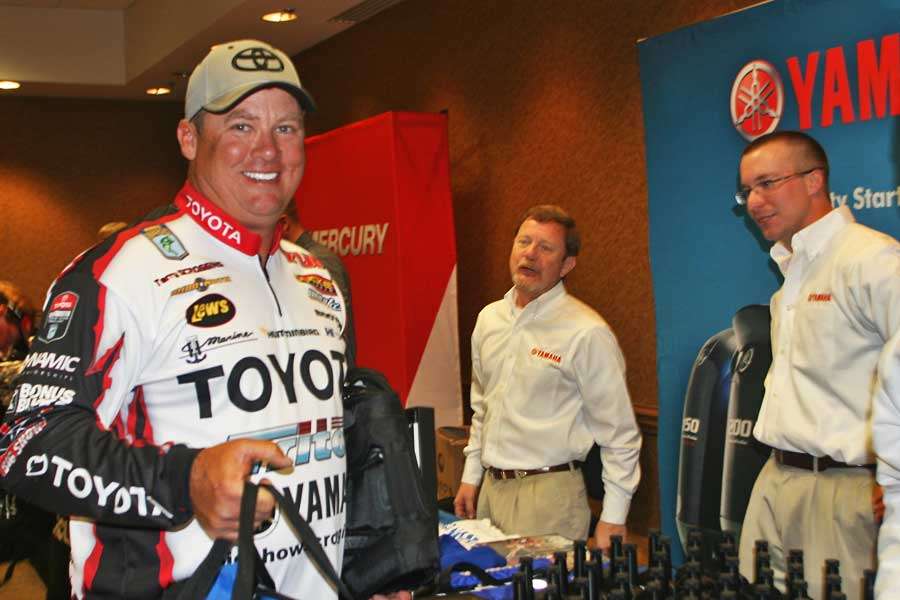 <p>Terry Scroggins grabs his SWAG from Yamaha</p>
