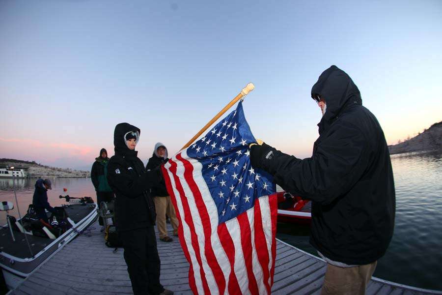 The B.A.S.S. staff prepares the American flag for the national anthem.