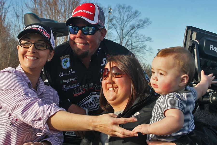 Chris Lane, the final angler in line, stops to pose with some fans.