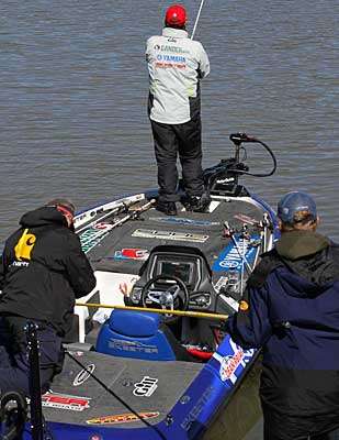 GoPro is one of the presenting sponsors of the Geico Bassmaster Classic. In this image, Bassmasterâs Shaye Baker trades out a memory card for a GoPro on Dean Rojasâ boat.