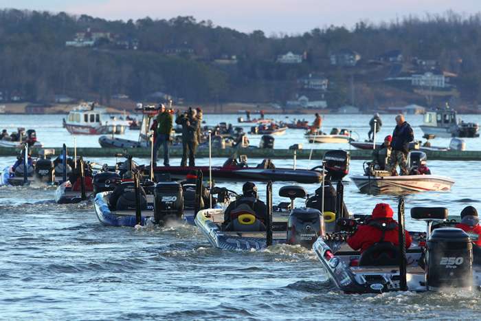 Competitors idle from the launch area in Guntersville, Ala., to begin the final day of fishing. 