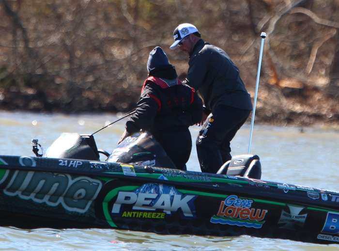 Roumbanis hooks up with his fourth keeper fish of the day. The next seven frames document him putting another quality fish in the boat. 