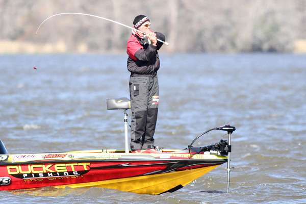 On the main lake, Boyd Duckett makes a cast on a large flat.

