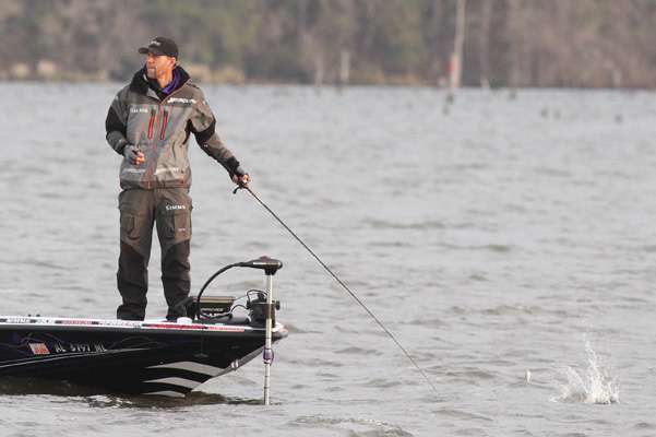Aaron Martens slaps grass off his lure during the early part of Day Four.
