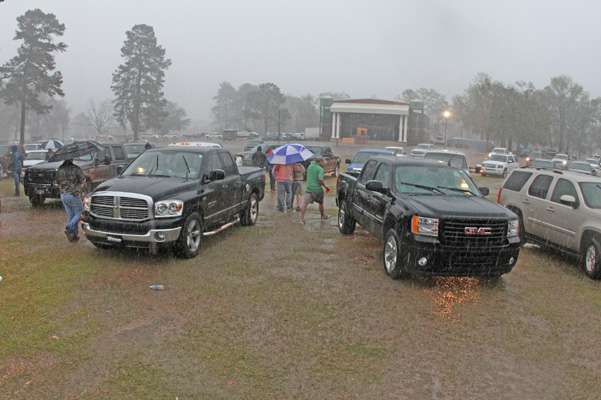 Still, fans moved their vehicles close and watched from the dryness of their cars or trucks.