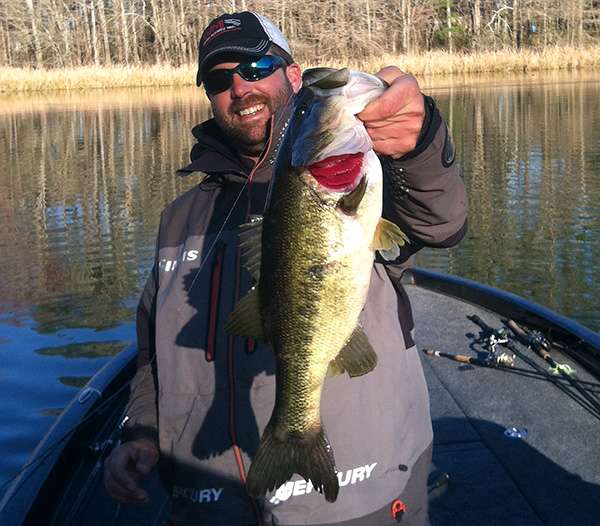 Nate Wellman is all smiles with this 4-pounder in hand.