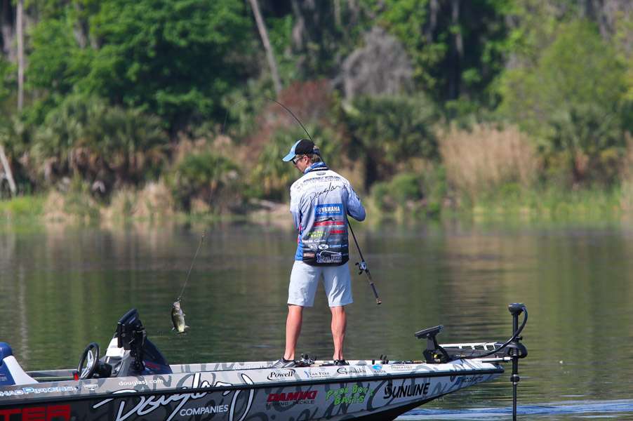 Chad Pipkens swings a smaller fish over the rail.