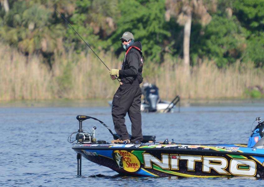 Ott DeFoe bundled up not from the cold, but avoiding the sun on Day 3 of the Bassmaster Elite on St. Johns River.