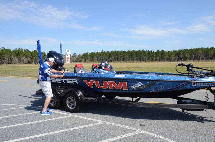 Alton Jones makes sure everything on his boat wrap is perfect.  