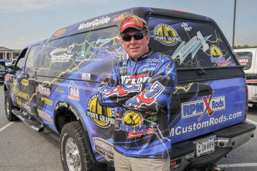 Rick Morris almost blends into his new truck wrap. 
