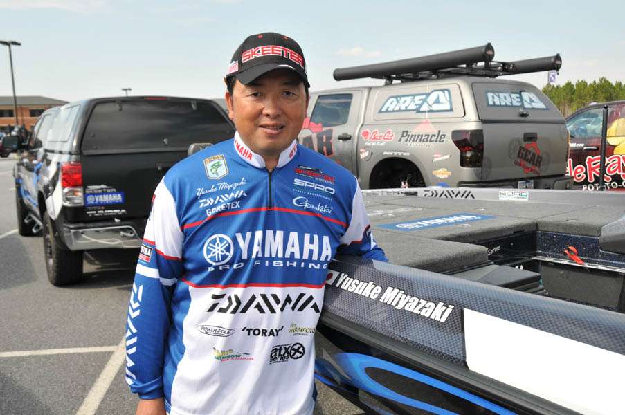 Yusuke Miyazaki stands in front of his new wrap. 