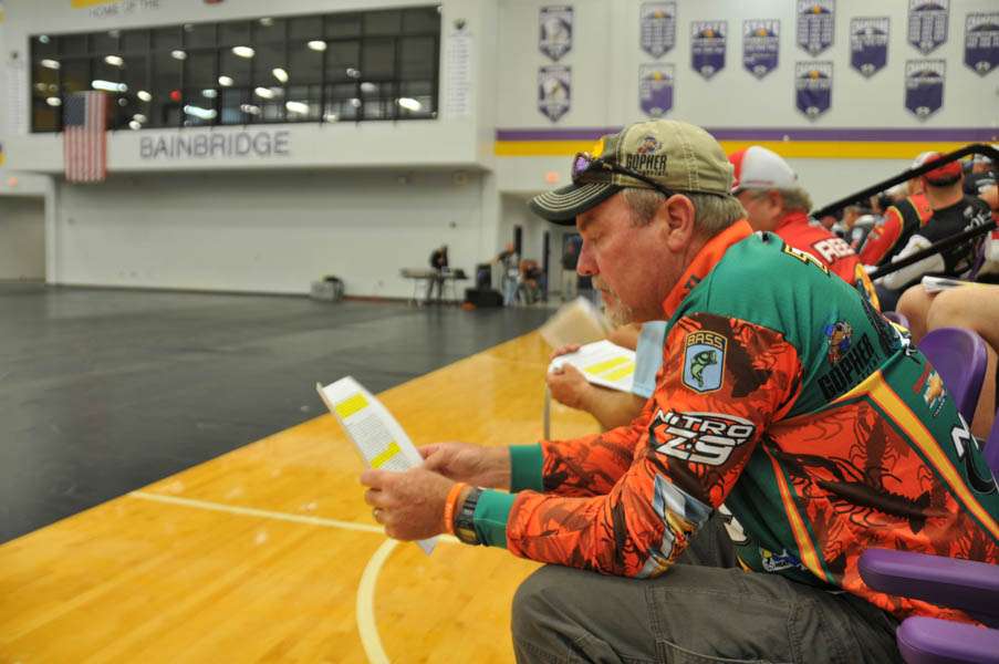 Dennis Tietje studies his copy of the 2014 rules. 