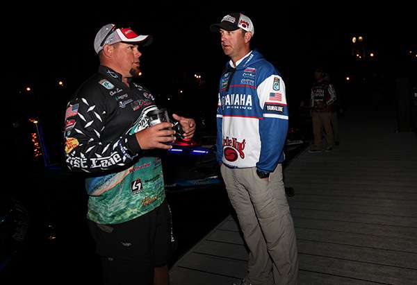Chris Lane and Todd Faircloth chat on the dock.