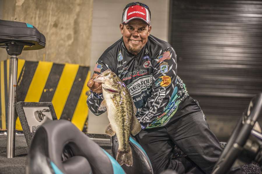 Garrick Dixon traveled from his home in Boston to photograph the 2014 GEICO Bassmaster Classic on Alabama's Lake Guntersville. These are his top 25 photos.  In this one, 2012 Classic champ Chris Lane shows off his biggest fish, prior to weigh-in.