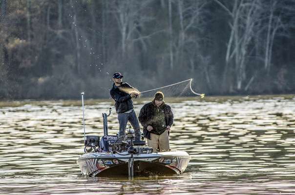 Garrick Dixon culled out his favorite 20 casting photos from the 2014 GEICO Bassmaster Classic.  First up is Brandon Palaniuk, casting with enough force to unleash a spray of water. 
