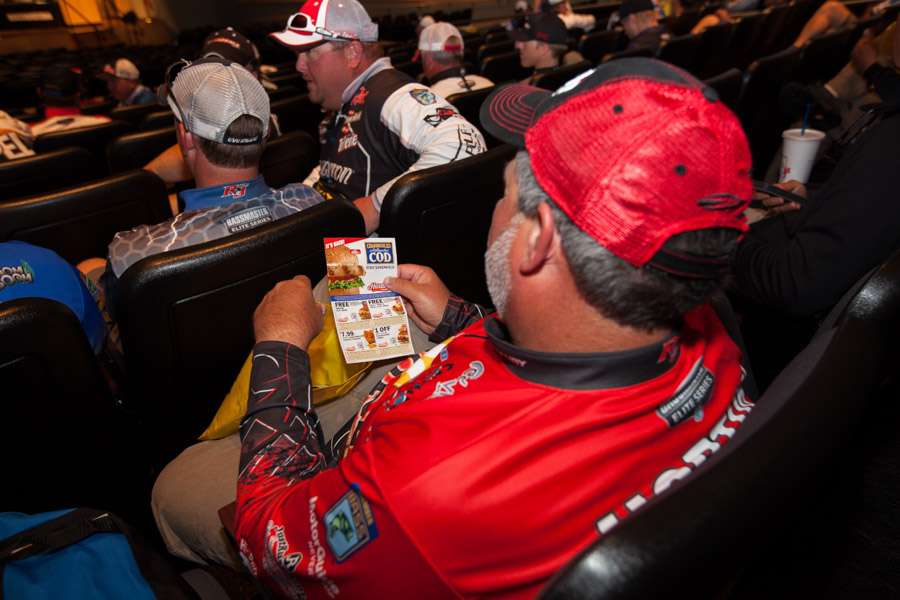 Jamie Horton looks over his new Hardeeâs coupons.