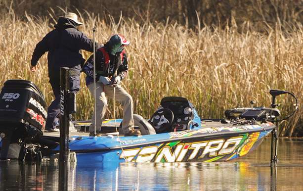 Ott Defoe sets the hooks on a big Lake Seminole bass. 
