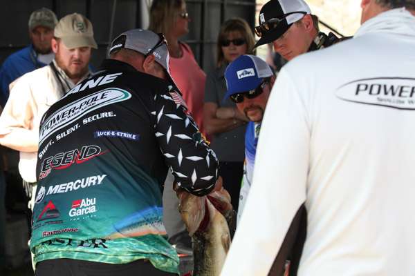 Chris Lane concerns himself with fish care, with good reason.