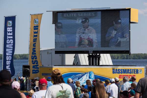 The big screens help everyone to see the action.