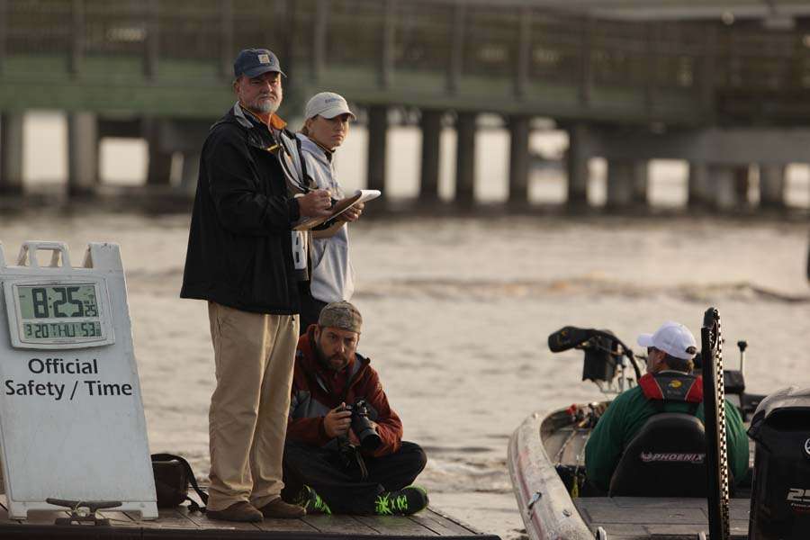 B.A.S.S. staffers Max Leatherwood and Lisa Talmadge watch the anglers leave. 