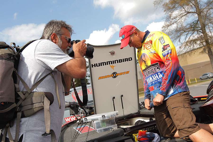B.A.S.S. photographer James Overstreet takes pictures of Keith Combs' new jersey.