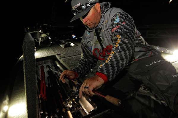 Hite gets some of his rods ready to go this morning.