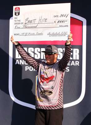 Hite grabs a check from B.A.S.S. for being the current points leader for Toyota Bassmaster Angler of the Year.