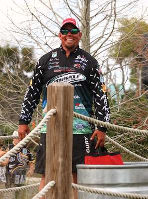 Chris Lane is all smiles as he waits to cross the stage.