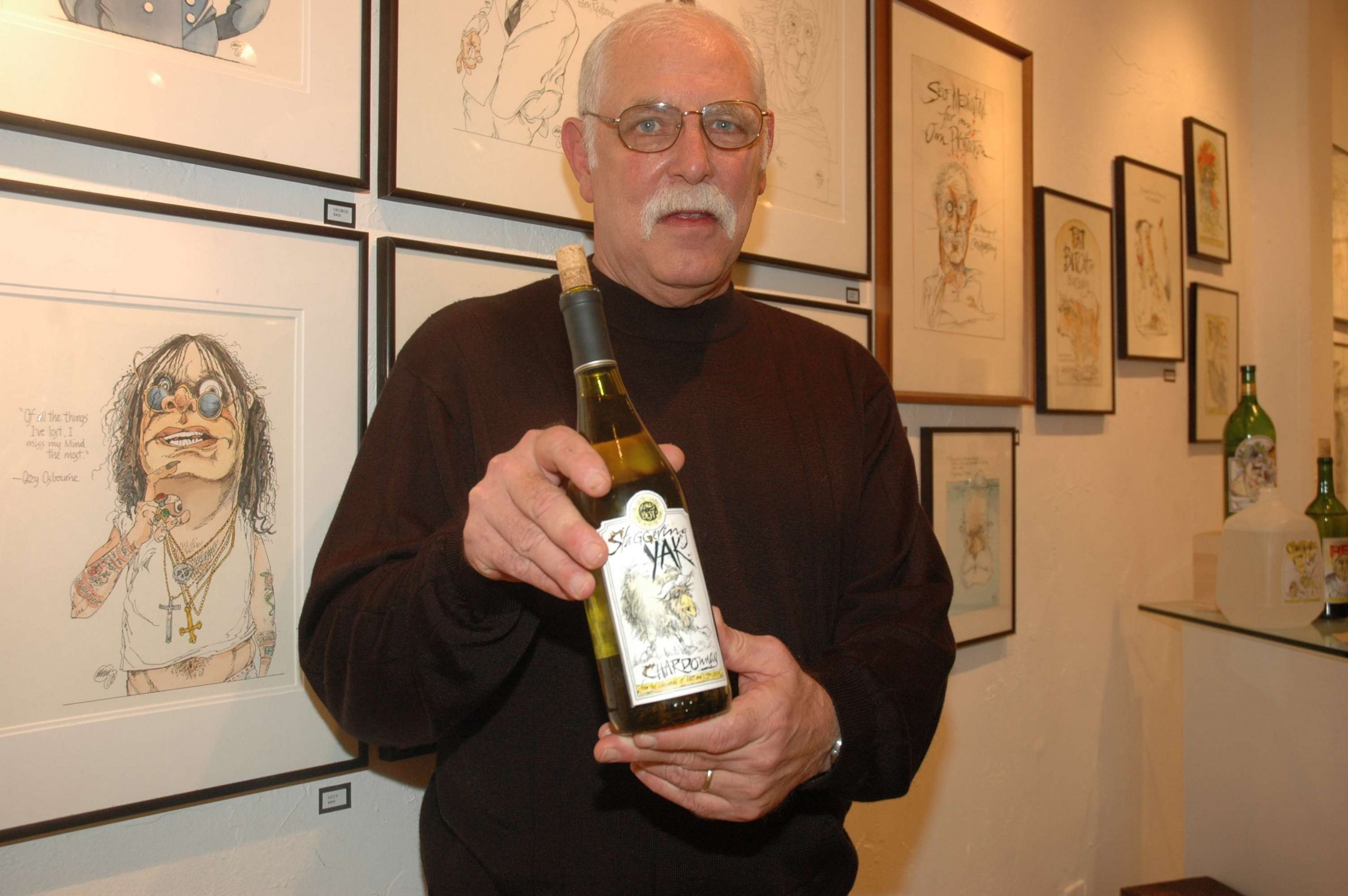 Armstrong's illustrations were not just for printed magazines, either. At a gallery in 2008 where his artwork was featured, he displays a bottle that contained his illustrations and several framed prints behind him that were collectors' items among his fans. Chris, thank you for your work and your friendship through all the years. We'll miss you.