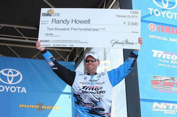 Randy Howell holds up his check from Bass Pro Shops.