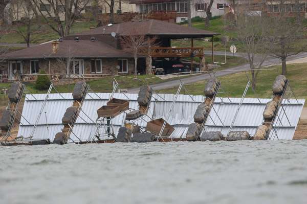 This covered boat dock was right side up as we passed it heading to shelter prior to Thursdayâs storm.  