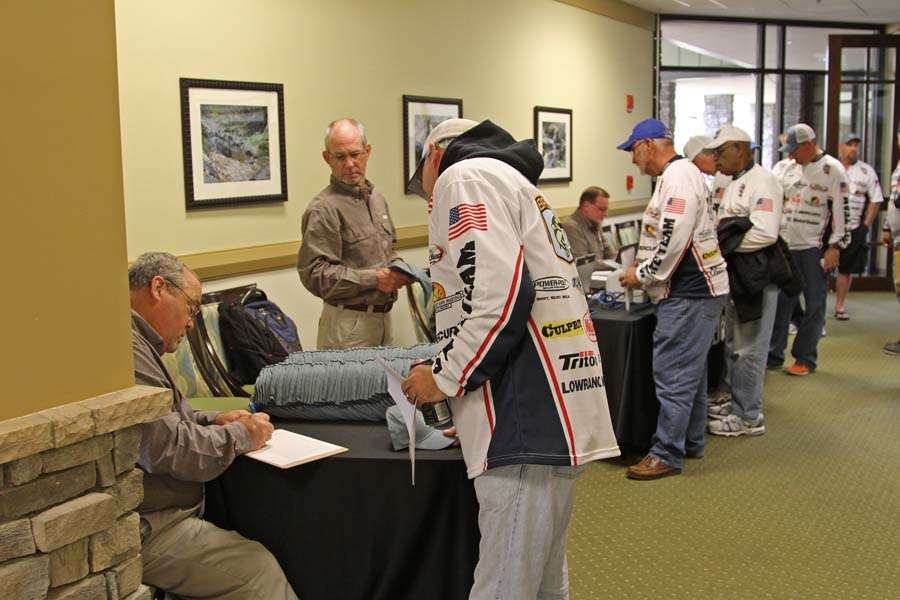 Anglers make their way through the registration line.