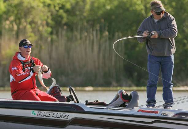 While Mitchell was still unhooking his keeper, his co-angler Craig Crim hooks up with a fish. 