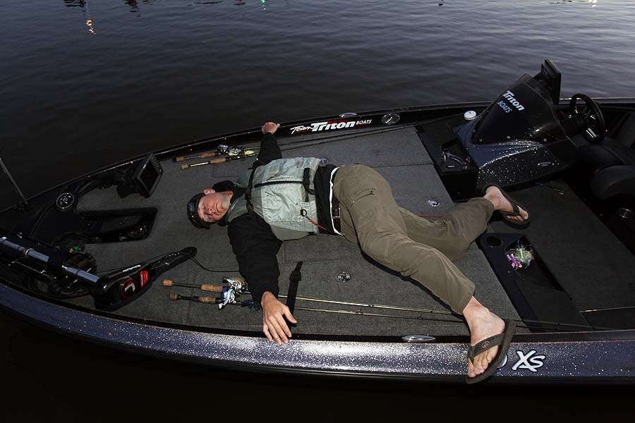 You might mistake this man as being in pain. Heâs not. Itâs Aaron Johnson doing stretching exercises on the deck of his boat.