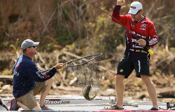 Browning is pumped as he sees Glasby safely net the fish.