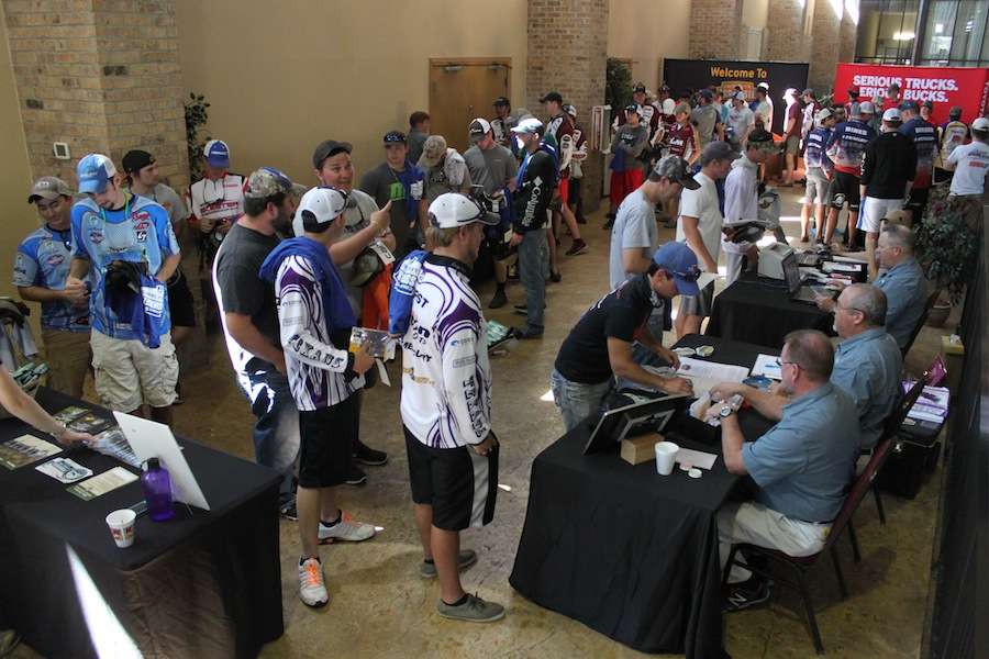 Anglers make their way through registration. 