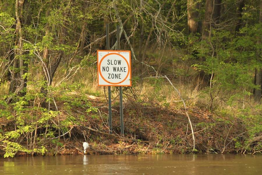Slow no wake in several areas. Many permanent residents live in their boats on the Ouachita River. 