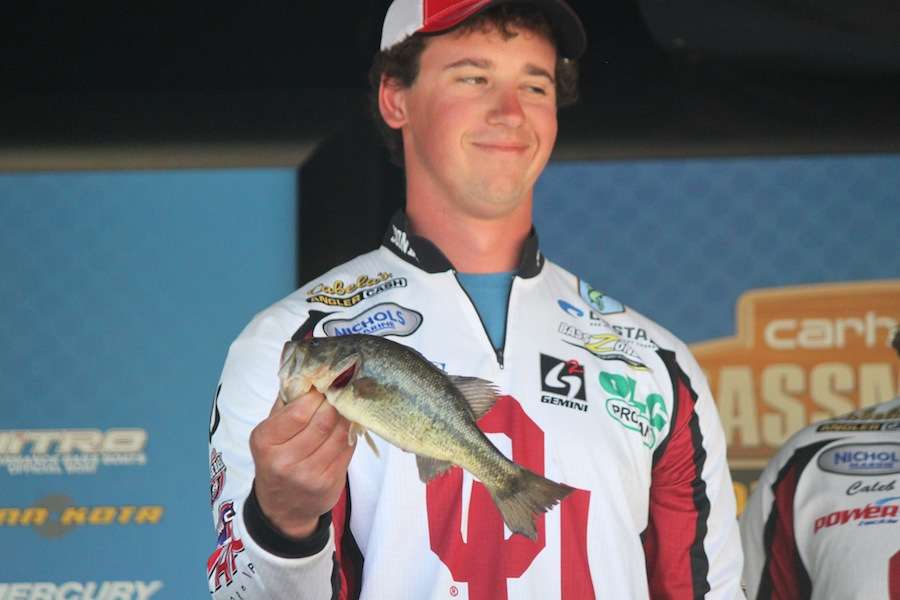 The University of Oklahoma's Landon Dixon and Caleb Masters almost nab the smallest fish of the day award with this 14 ouncer. 